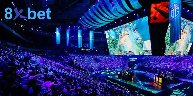 Nhà thi đấu esports chật kín khán giả với màn hình lớn chiếu trận Dota 2